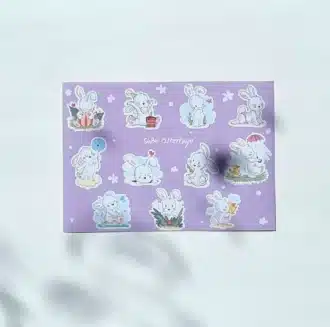 a purple card with stickers on it