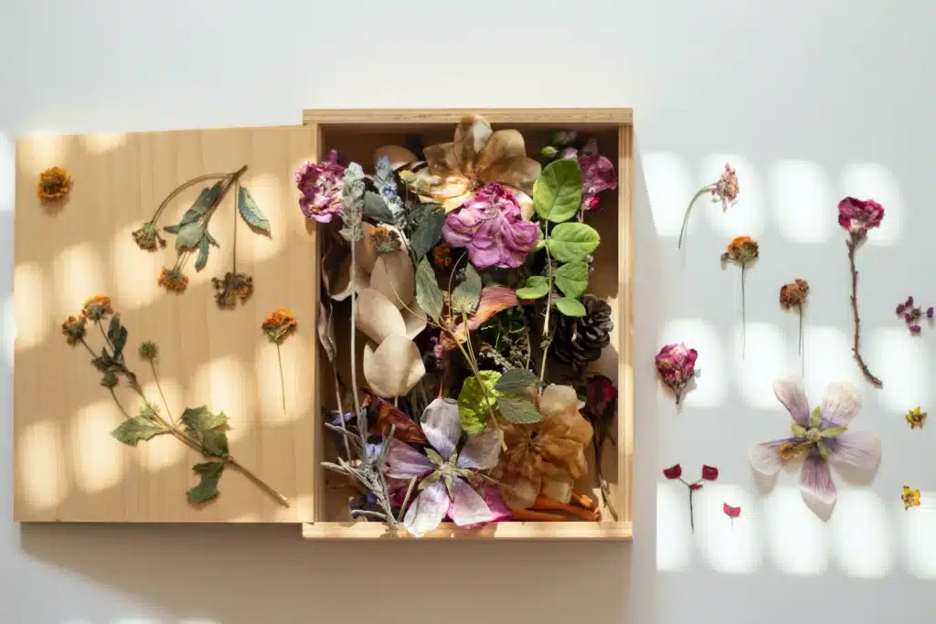 a box with flowers and leaves
